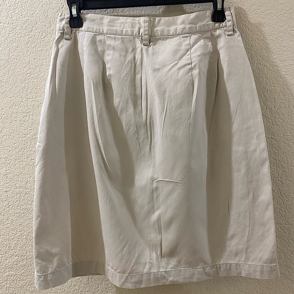 A beige button down Eddie Bauer skirt. Size 10, barely worn